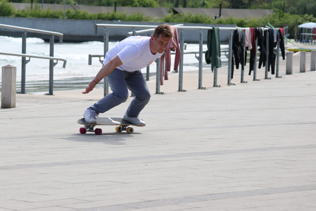 Dr Roy Hamilton surf skating blue health